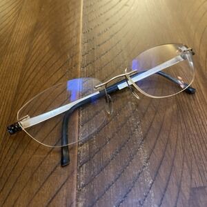 Silhouette Gold & Black Rimless Eye Glasses 5452 20 6051 17 135 Australia 051